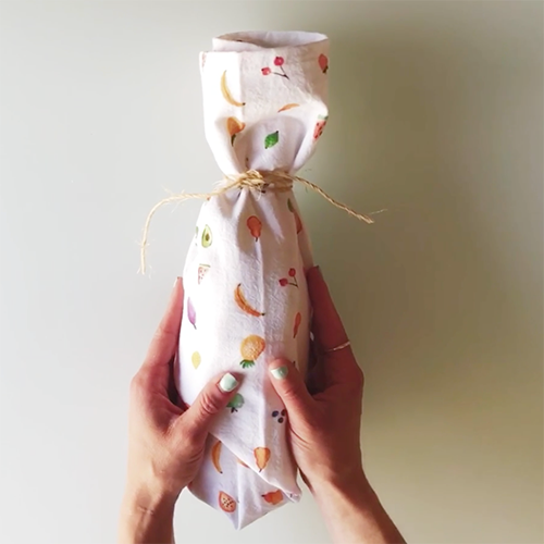 2 in 1 gift idea: How to wrap tea towel around a wine bottle